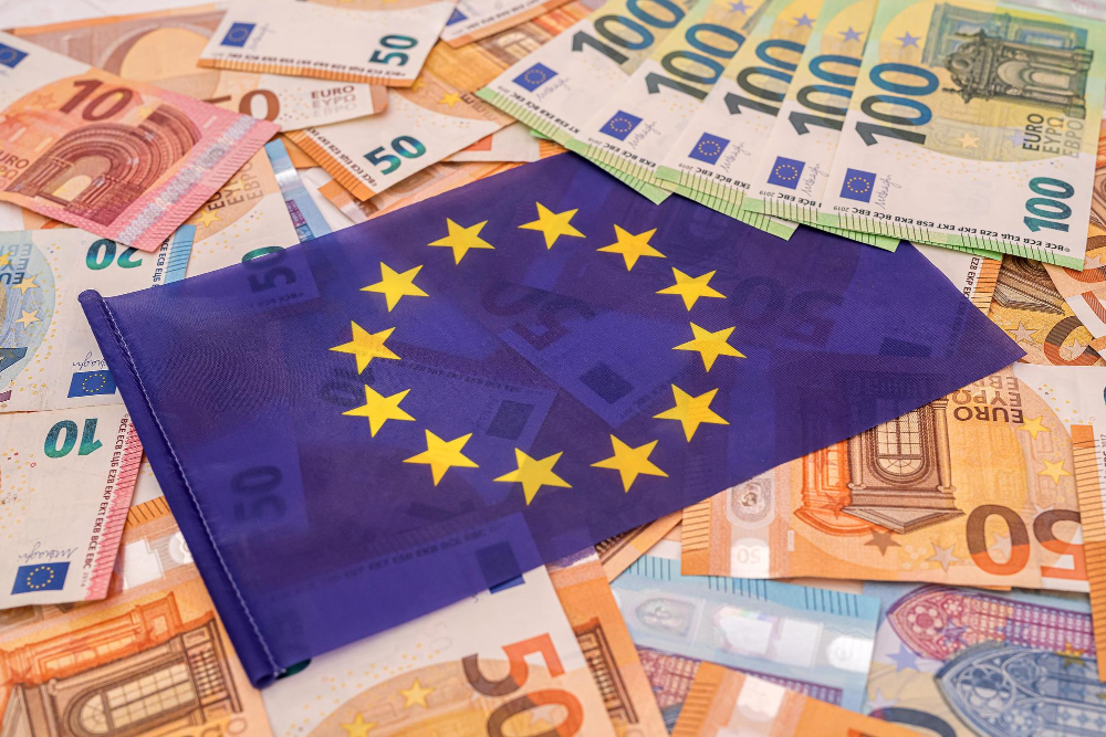 beautiful colored new euro bills which lies blue euro flag concept european union